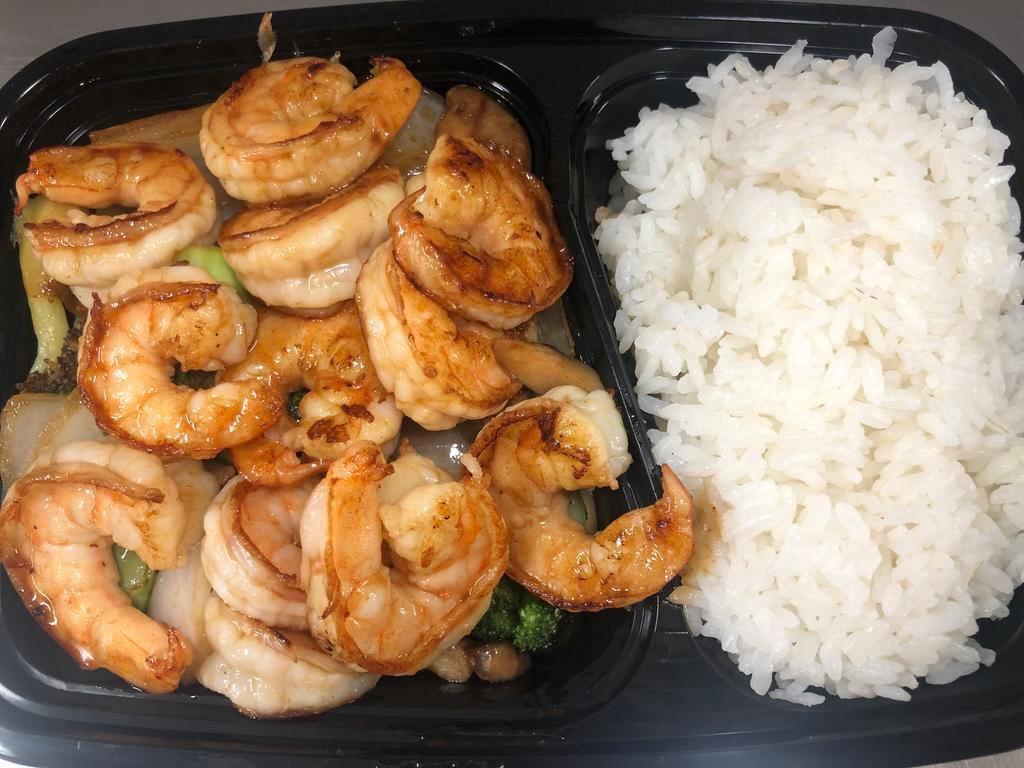 Hibachi Jumbo Shrimp · grilled jumbo shrimp with soy sauce & garlic.  Served with mixed vegetables & Steam Rice