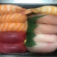 Sushi Combo · two pieces each of bluefin tuna, salmon, yellowtail, shrimp & albacore nigiri w/ a tuna roll 
