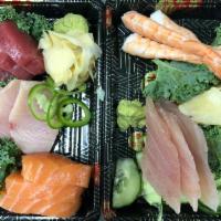 Sashimi Combo · three pieces each of bluefin tuna, salmon, yellowtail, albacore & shrimp sashimi 