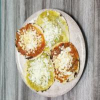 4 Chalupas · Fried tortillas topped with green or red sauce with onions and cheese.