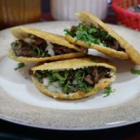 3 Gorditas · Handmade tortilla pocket stuffed with your choice of meat, with cilantro and onions.