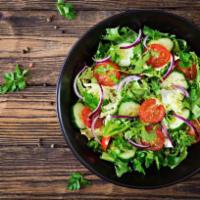 Avocado Salad · Romain lettuce, cherry tomatoes, avocado and lemon vinegar.