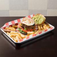 The Mama Burger · Beef burger served with lettuce, tomato, avocado, fried egg and fried onions topped with our...