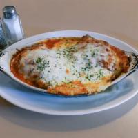 Eggplant Rollatini · Served with your choice of pasta.