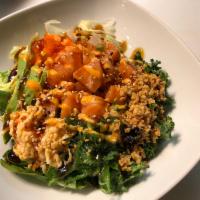 Salmon Poke Bowl · Fresh Salmon, avocado, onions, fish eggs seaweed salad, crab meat and crunch with poke bowl ...
