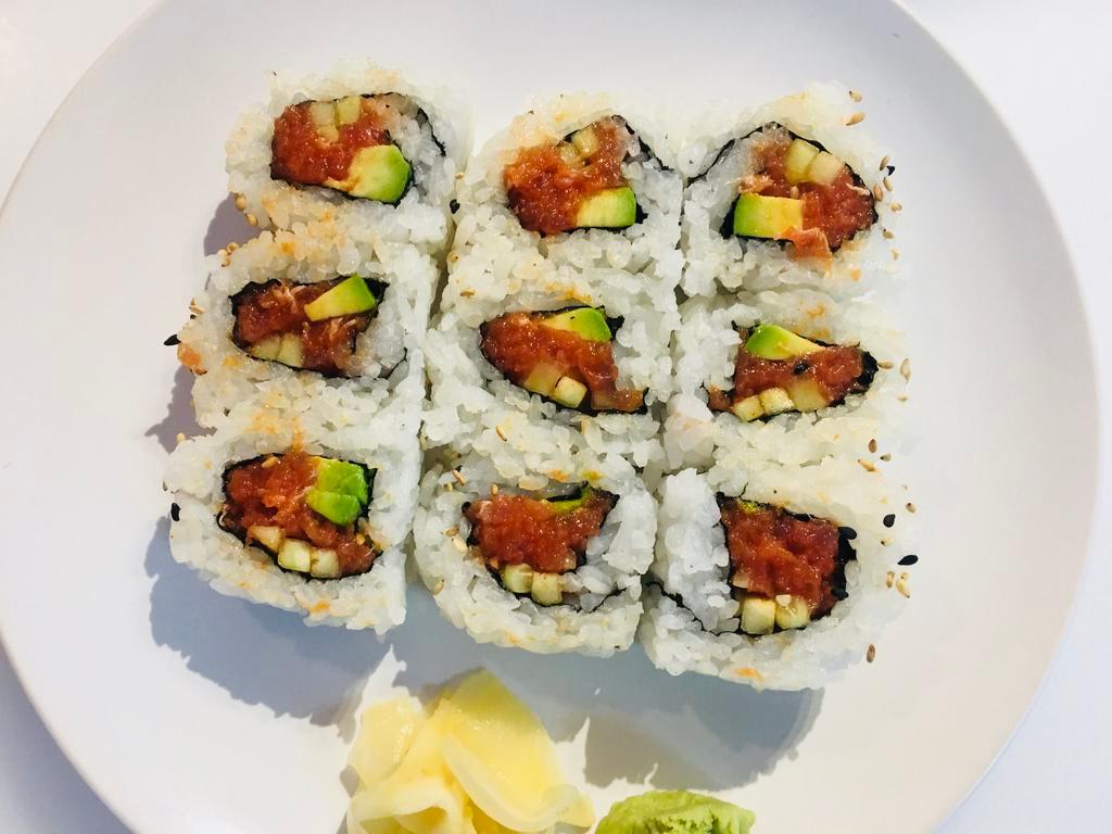 Tuna Spicy Roll · A roll that is rolled inside out with Avocado, Cucumber and spicy tuna. (9 pieces)