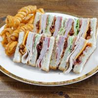 The Delight Club · Imported ham, roasted turkey and crisp bacon with cheddar and Swiss cheese, layered between ...