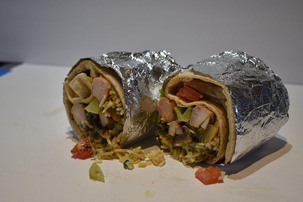 Shrimp Curry Burrito  · Curry sauce infused with fennel ＆ herbs, tomatoes, onions, ＆ tamarind.