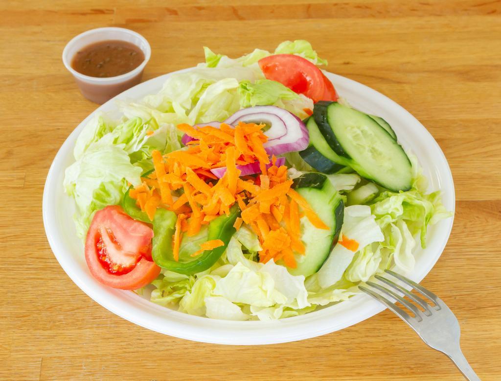 Garden Salad · Iceberg, tomatoes, green peppers, onions, carrots, cucumbers.