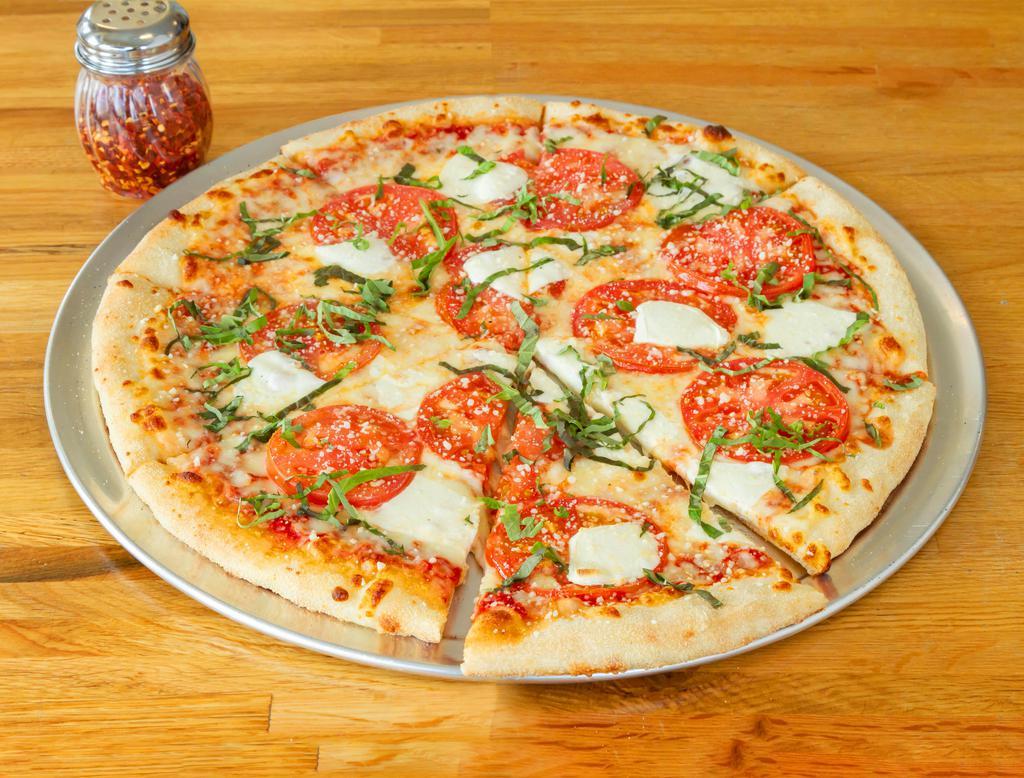 1. Margherita Pizza · Tomatoes, basil, fresh mozzarella and Parmesan.