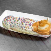 The Party Dulce · Covered with white chocolate and sprinkles on top.