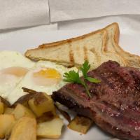 Steak and Eggs · 6 oz. steak with eggs any style, breakfast potatoes and toast.