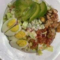 Cobb Salad · Romaine lettuce, tomatoes, onions, cucumber, bacon, egg, blue cheese, chicken breast, avocad...