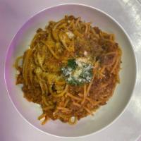 Spaghetti Bolognese Pasta · Homemade ground meat stew in rich tomato sauce, topped with grated Parmesan cheese.