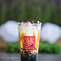 Muddy Okinawa · Okinawa Brown Sugar with Milk tea. 
whipped cream & oreo cookies on the top