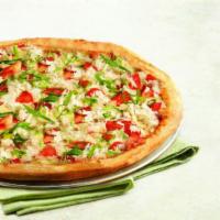 Maryland Style Crab Pizza · Handfuls of flavorful crab meat and fresh tomatoes in our Old Bay spiced Alfredo sauce, topp...