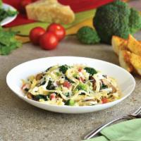 Veggie Fettuccine Alfredo · Sautéed Broccoli, Mushrooms, Spinach, and Diced Tomatoes in our Creamy Alfredo Sauce, served...