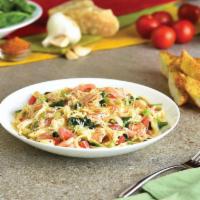 Shrimp Fettuccine Alfredo · Sautéed Shrimp, Spinach and Diced Tomatoes, in our Old Bay™ Spiced Alfredo Sauce, served ove...