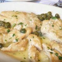 Pollo alla Lemone · Boneless, baked chicken breast with special spices, lemon and capers.