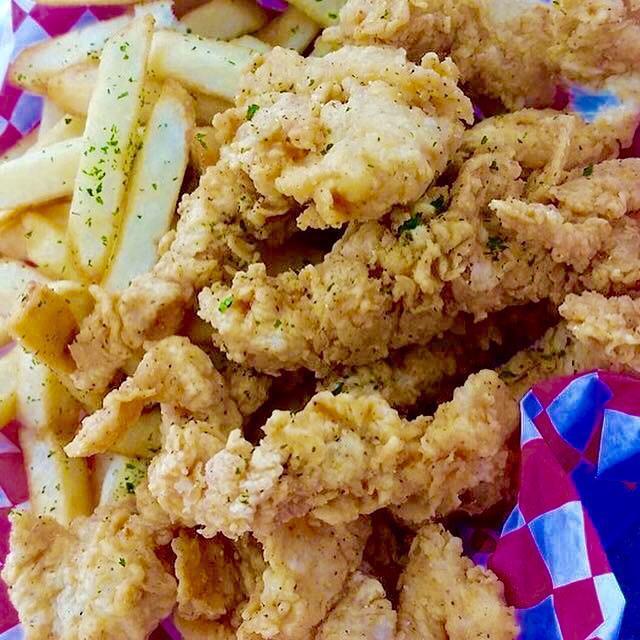 Chicken Strips Tackle Box · Hand-breaded chicken breast strips fried in our signature Tackle Box seasoning, 1 side dish, choice of signature sauce.