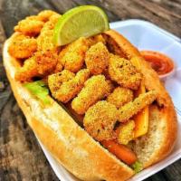 Shrimp Po Boy · Fried shrimp, lettuce, tomatoes, pickles, onions, cheese, served on a soft roll, with choice...