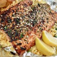 Salmon Plate · Blackened salmon fillet served with our yellow cilantro rice, finished with our signature ga...