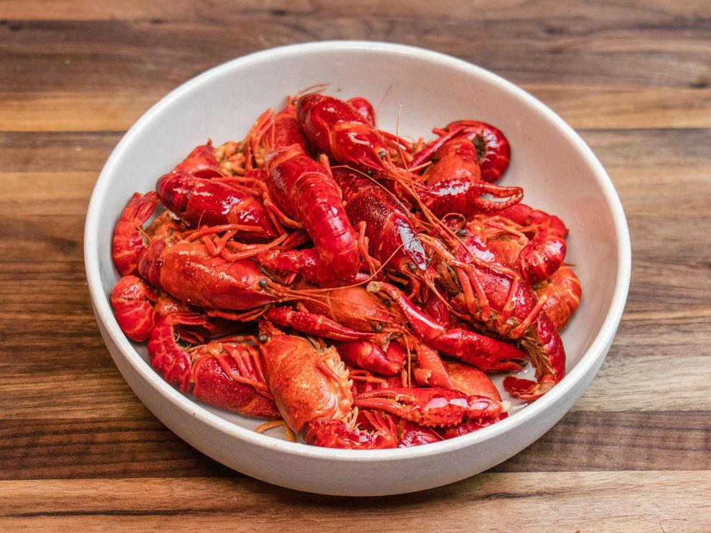 Crawfish · Egyptian crawfish steamed to order and drizzled with garlic butter and Happy Claws' spice blend.