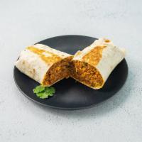 Impossible Asian Burrito · Korean glazed beyond beef, kimchi fried rice, green onion, cilantro, gochujang aioli and Cot...