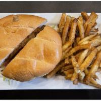 Torta de Milanesa · Breaded steak, tomatoes, onion, avocado, chipotle mayo, served with truffle french fries and...