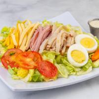 45. Chef's Salad · Ham, turkey, Swiss, American cheese, lettuce, tomatoes, onion, cracker. Celery and carrots w...