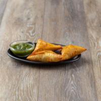 Mutton Samosa · Crispy turnovers with ground mutton and spices.