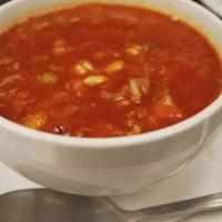 Maryland Crab Soup · Tomato soup with crab and vegetables.