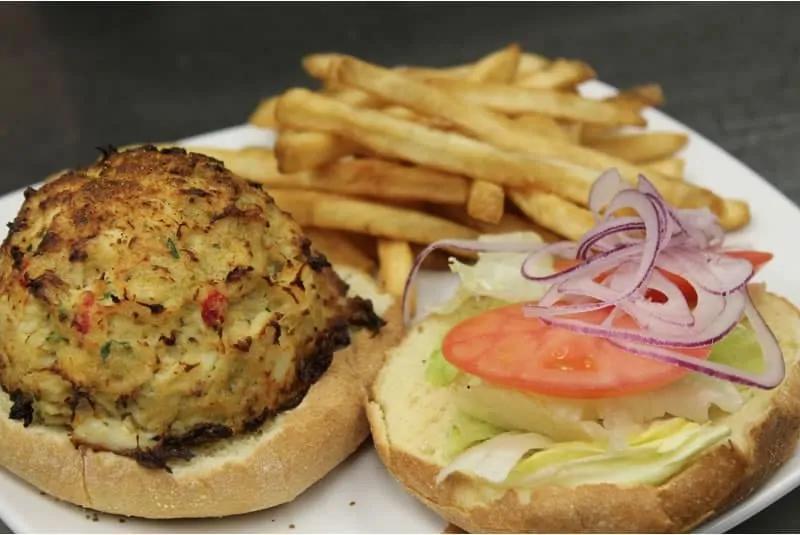 Crab Cake Sandwich · Our jumbo lump crab cake on a roll, served with lettuce, tomato, and onion.