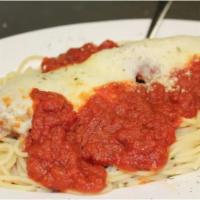 Eggplant Parmigiana  · Served over spaghetti. Served with a side of garlic bread.