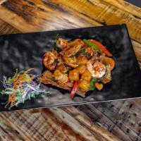 Pad Paradise · Sauteed beef, chicken and shrimps with cashew nuts, red peppers, carrots, basil, snow peas, ...