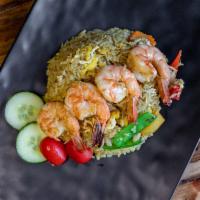 Mango Fried Rice · Stir-fried with chicken and shrimp, onions, snow peas, red peppers, mango chunks, carrots, a...