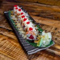 Sweet Heart Roll · Spicy tuna, avocado, and tempura flake, wrapped with soy paper and top with salmon and red t...