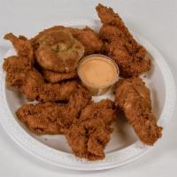 Tenders Family Meals · 12 pieces Cajun tenders, 6 biscuits and family fries.