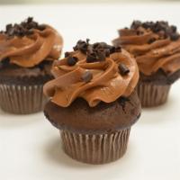 Chocolate Fix · Moist chocolate cake drenched in delicious chocolate butter cream frosting topped with choco...