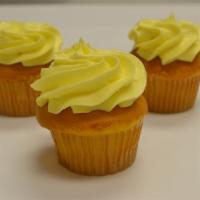 Lemon Boost · Zesty lemon cake loaded with creamy lemon curd covered in lemon butter cream. 
