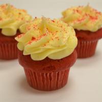 Red Velvet Rescue · Deep red cocoa cake topped with classic cream cheese frosting. 
