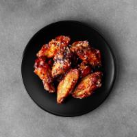 4 Pieces Combo Wings  · 4 pieces of our traditional chicken wings with over 10 sauces and dips to choose from, Serve...