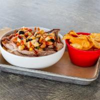 Cowboy Mashed Potato Bowl · Mashed Potatoes topped with Pulled Pork, Cowboy Caviar, Smoked Gouda Cheese Sauce & a drizzl...