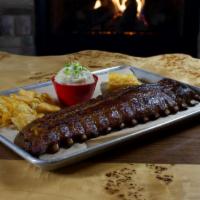 Legendary Ribs Dinner · 8 pieces. Served with our House Kettle Chips & Piggy Sauce.