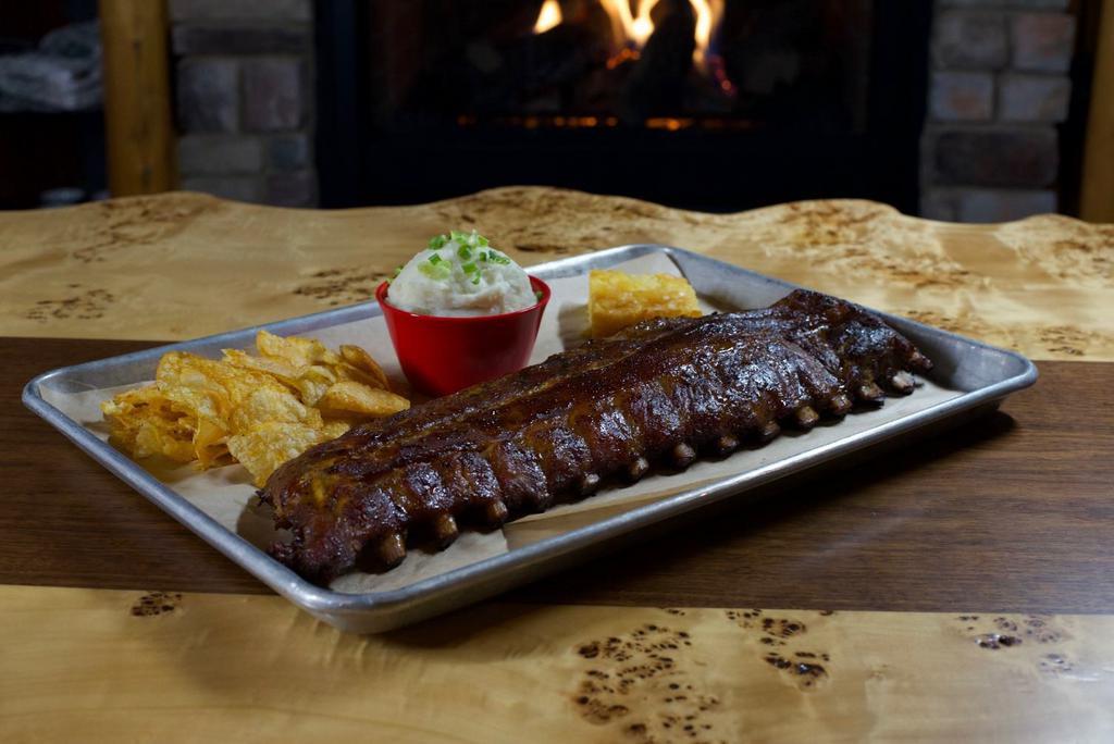 Legendary Ribs Dinner · 8 pieces. Served with our House Kettle Chips & Piggy Sauce.