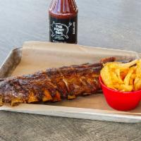 Full Rack of Legendary Ribs  · 12-14 pieces. Server with our House Kettle Chips & Piggy Sauce.