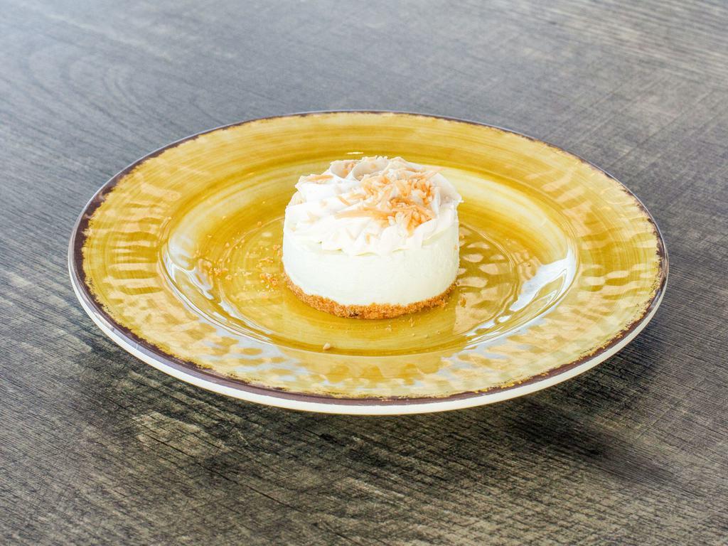 Key Lime Pie · Mini Keylime Pie with Graham Cracker Crust topped with Toasted Coconut