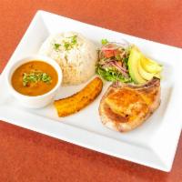 12 oz. Chuleta · Grilled pork chop with rice, beans, sweet plantain.