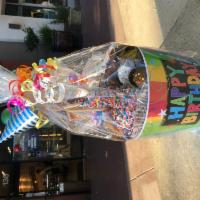 Birthday Bash Large Bucket · includes; 1 Sprinkle caramel Apple, 1 Birthday Truffle, 1 candy bar, 1 Chocolate dipped pret...