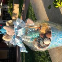 It's a Boy Large Gift Basket  · This basket includes; Apple of your choice, 2 Truffles, 1 candy bar, chocolate dipped pretze...